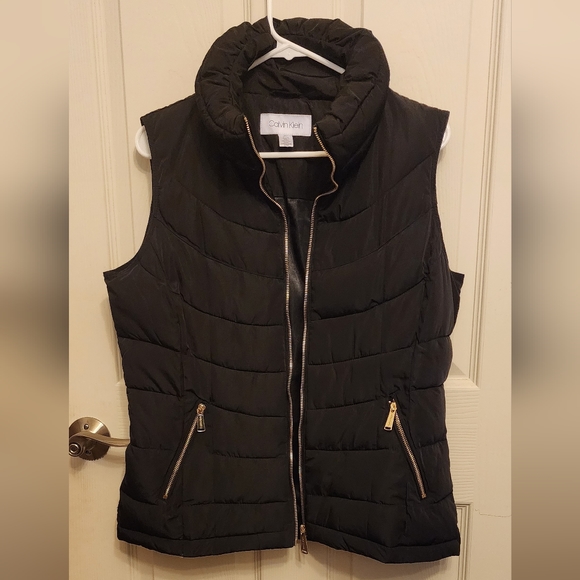 Calvin Klein Jackets & Blazers - Calvin klein black quilted Puffer vest with front zip pockets. Size medium